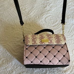 Brand new Betsy Johnson purse.